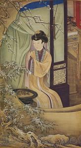 髪に花を挿す仕女